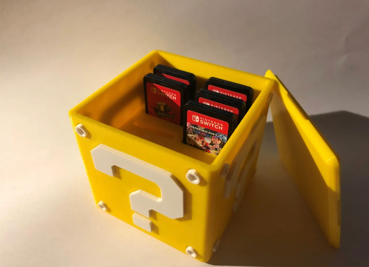Mario block switch game holder